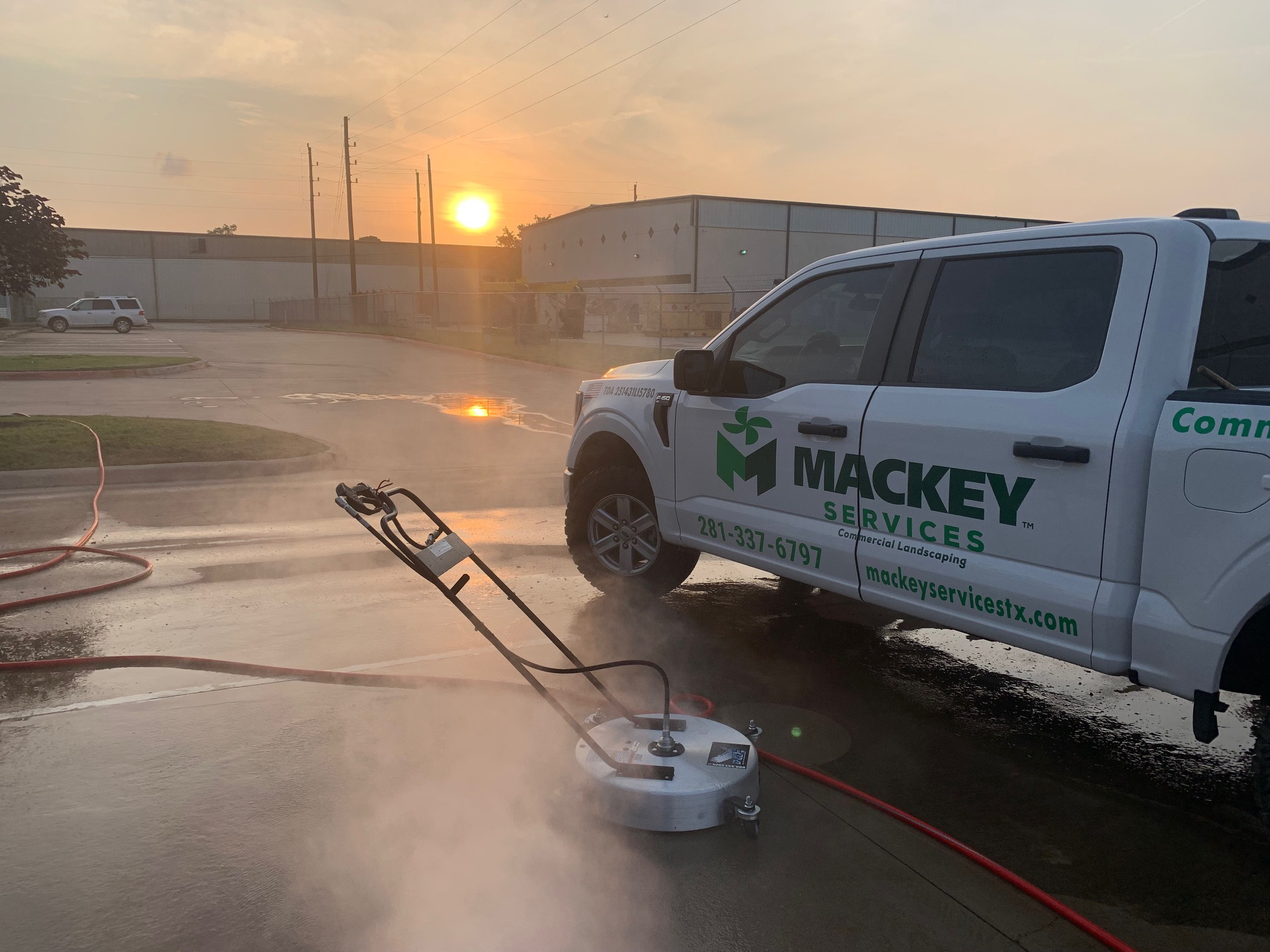 Mackey truck and surface cleaning equipment at a commercial property